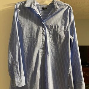 Blue with white striped shirt.